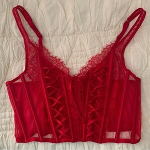 Victoria’s secret red lace semi sheer corset top
size medium